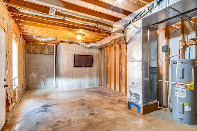 basement featuring water heater