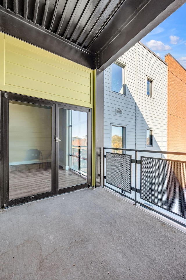 view of patio / terrace with a balcony