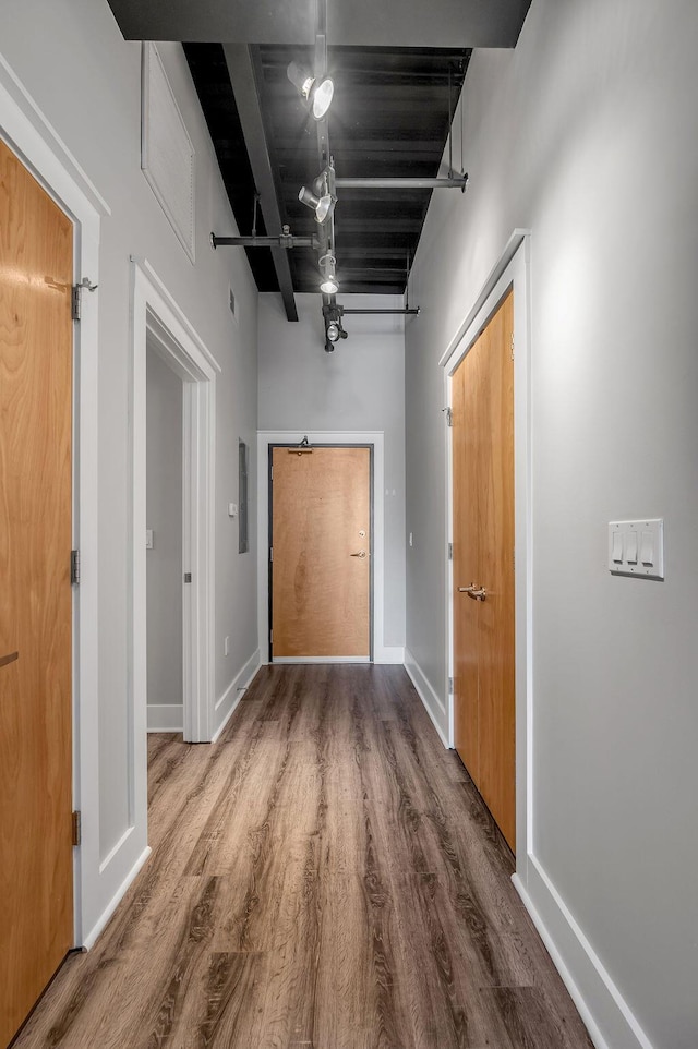 hall with hardwood / wood-style flooring