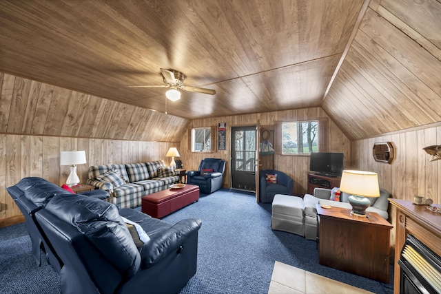 carpeted living room featuring ceiling fan, wood ceiling, wooden walls, and vaulted ceiling