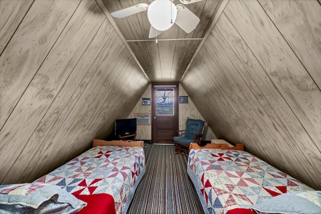 bedroom with lofted ceiling, ceiling fan, wooden ceiling, and wood walls