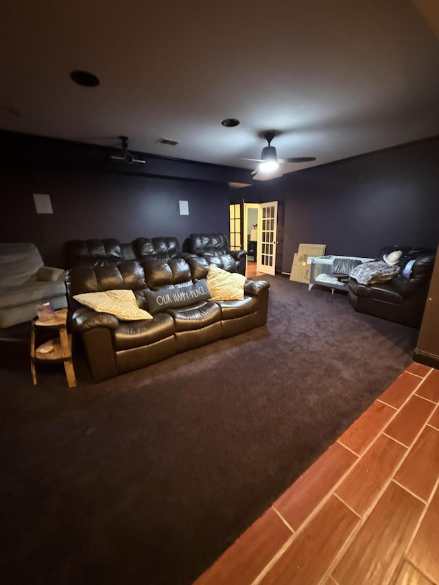 cinema room with ceiling fan