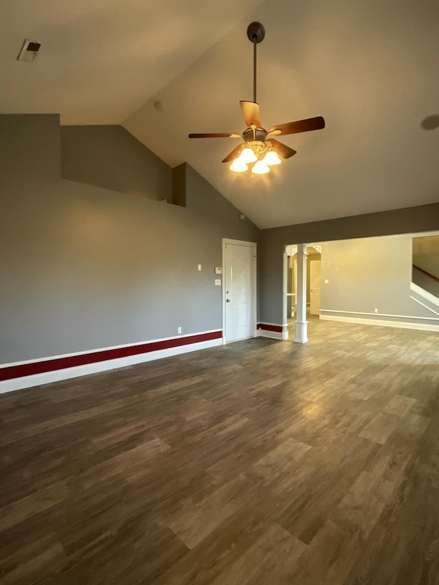 unfurnished living room with ceiling fan, high vaulted ceiling, and dark hardwood / wood-style flooring