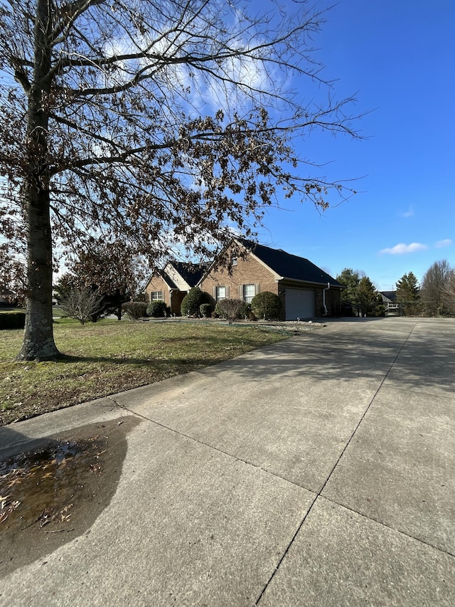 view of side of property with a garage