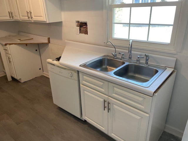 kitchen with dishwasher, white cabinetry, dark wood-type flooring, and sink