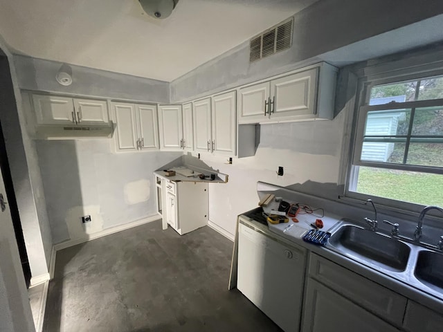 kitchen with white cabinetry and sink