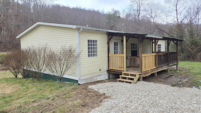 exterior space with a wooden deck