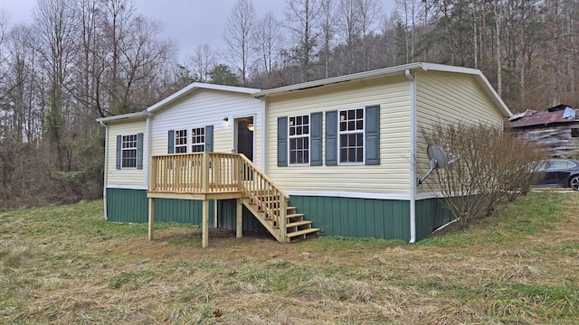 view of front of home with a wooden deck