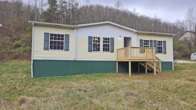 view of front of property featuring a deck