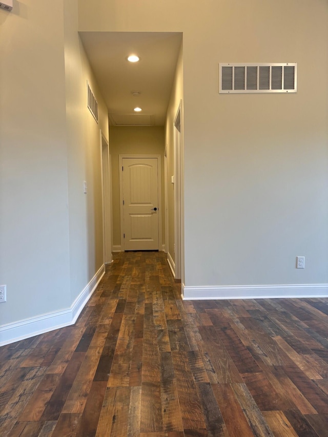 hall featuring dark wood-type flooring