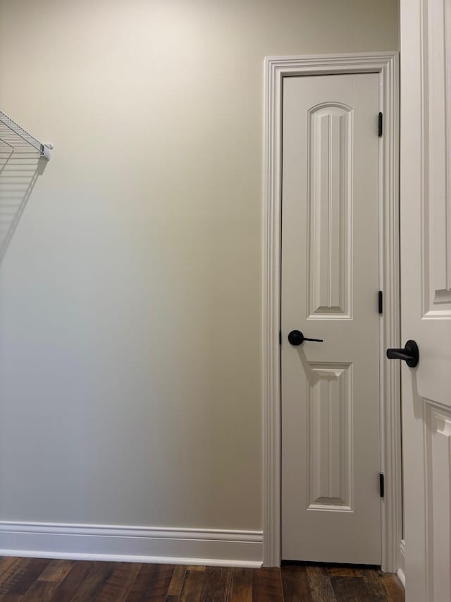 interior space with dark wood-type flooring