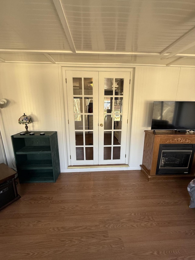 living room featuring hardwood / wood-style flooring and french doors