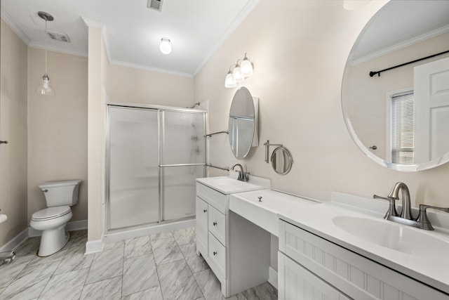 bathroom featuring ornamental molding, vanity, toilet, and a shower with shower door