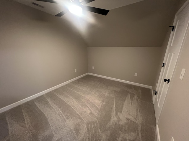 bonus room featuring ceiling fan, carpet floors, and vaulted ceiling