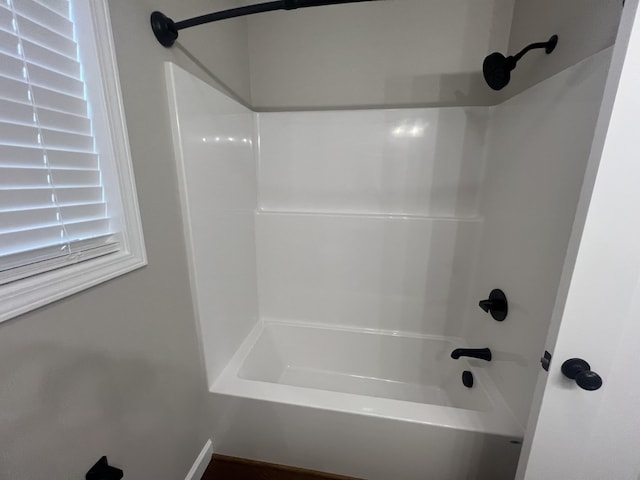 bathroom with shower / bathing tub combination