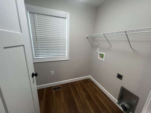 laundry area featuring hookup for an electric dryer, hookup for a washing machine, and dark hardwood / wood-style floors