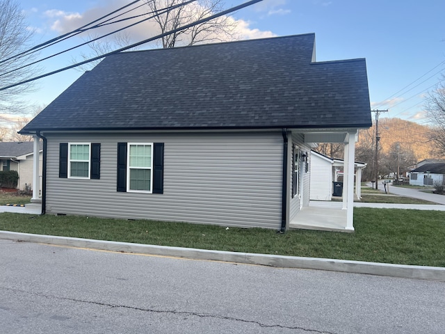 view of home's exterior featuring a lawn