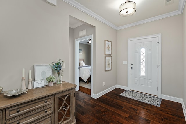 entryway with ornamental molding and dark wood-type flooring