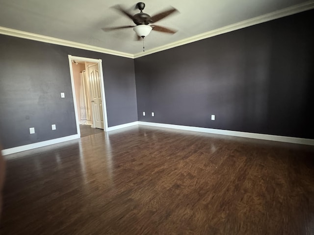 unfurnished room featuring dark hardwood / wood-style flooring, ceiling fan, and crown molding