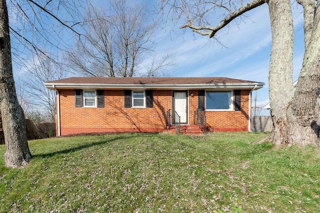 ranch-style house with a front lawn