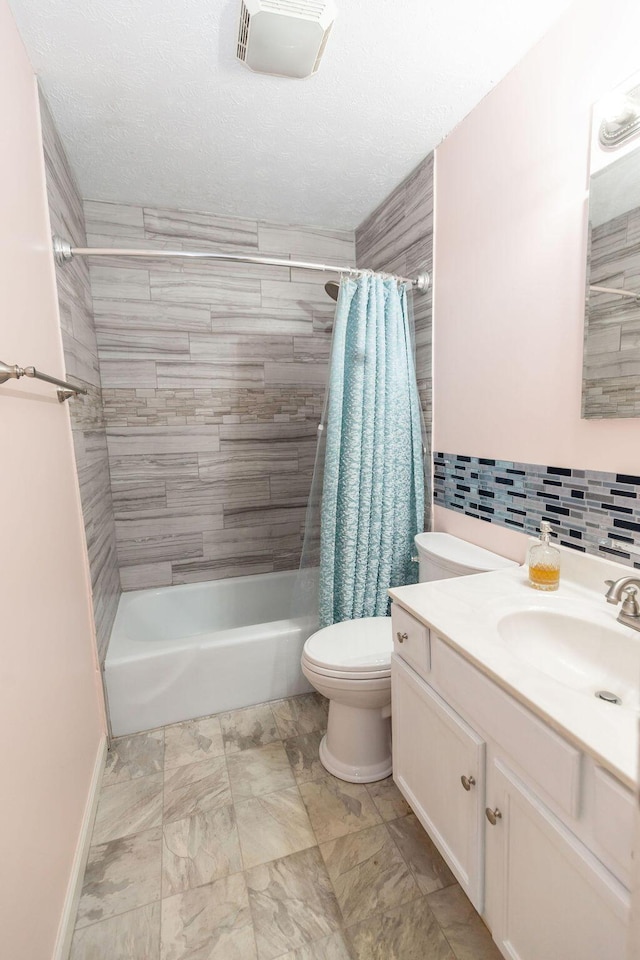 full bathroom featuring shower / bath combo, backsplash, vanity, a textured ceiling, and toilet