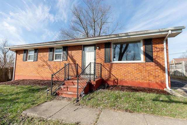 view of front facade with a front yard