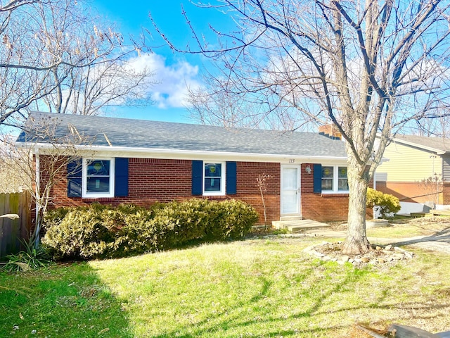 single story home featuring a front yard