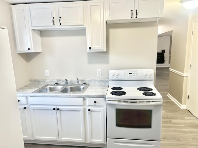 kitchen featuring white cabinets, sink, light wood-type flooring, and white electric stove