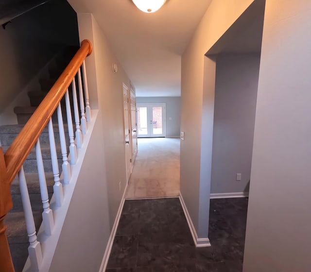 corridor featuring french doors