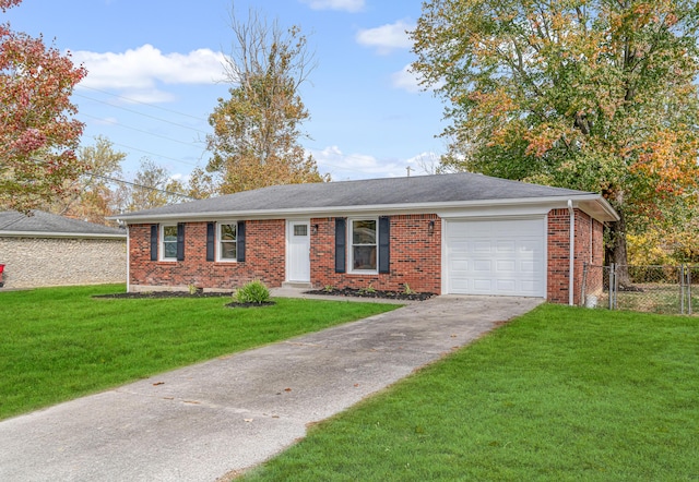 ranch-style home with a garage and a front yard