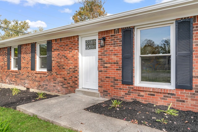 property entrance with a patio