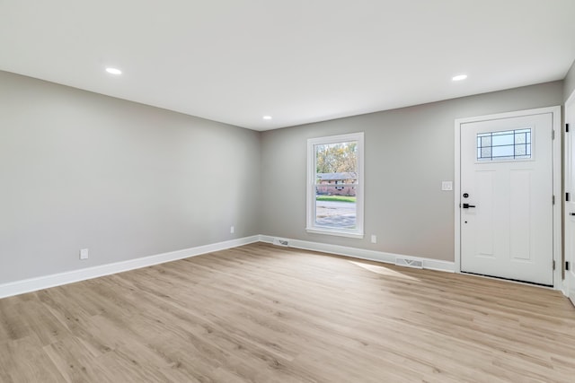 foyer with light hardwood / wood-style flooring