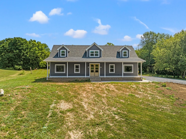 cape cod home featuring a porch and a front yard