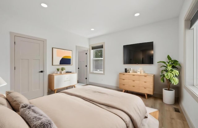 bedroom featuring light hardwood / wood-style floors