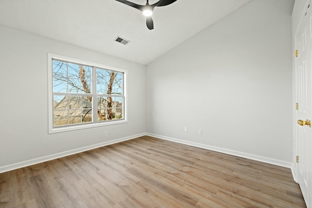 unfurnished room with light hardwood / wood-style flooring, ceiling fan, and lofted ceiling