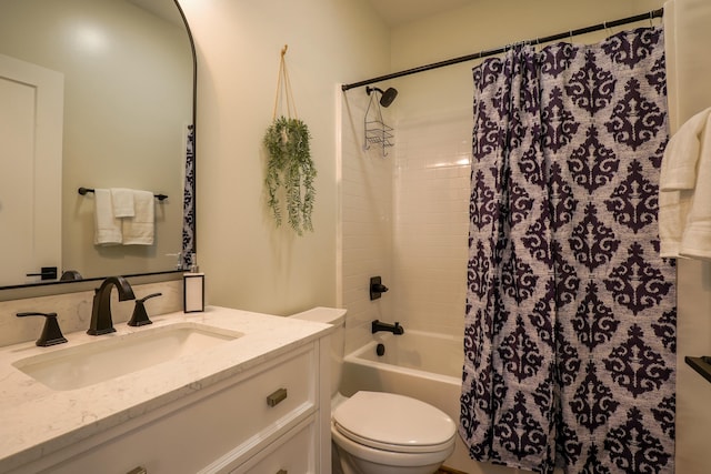 full bathroom featuring shower / bathtub combination with curtain, vanity, and toilet