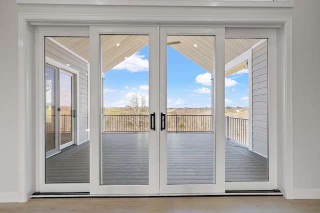 entryway with french doors and light wood-type flooring