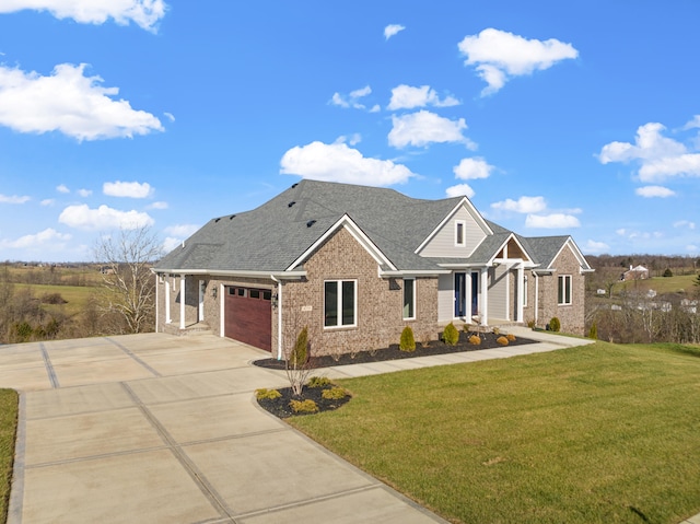 craftsman-style home featuring a front lawn and a garage