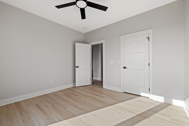 unfurnished bedroom with light wood-type flooring and ceiling fan