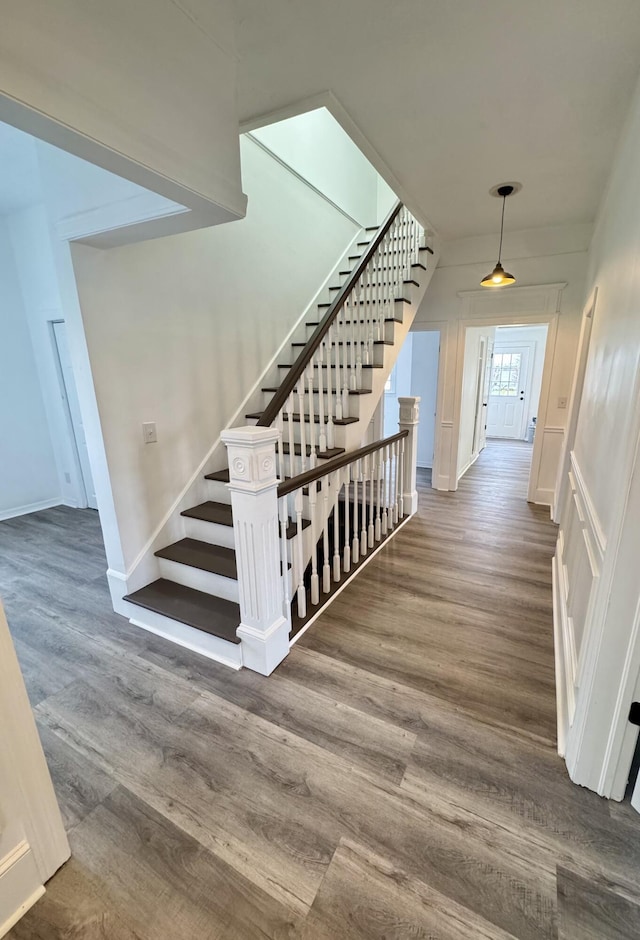 stairs with wood-type flooring