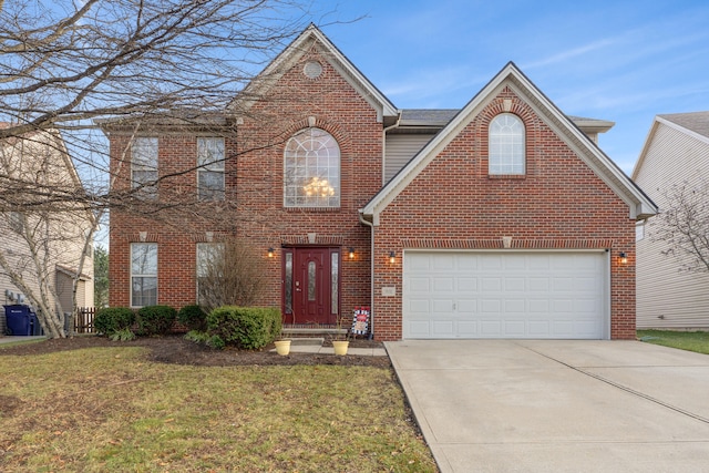 front of property with a front lawn and a garage