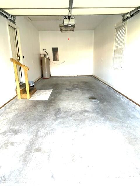laundry area with washing machine and dryer and wood-type flooring