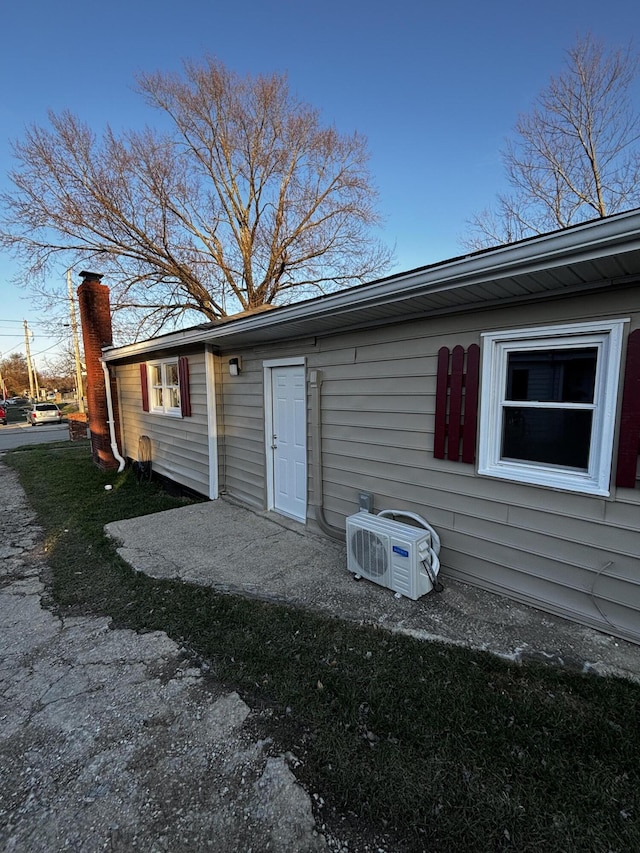 exterior space featuring ac unit