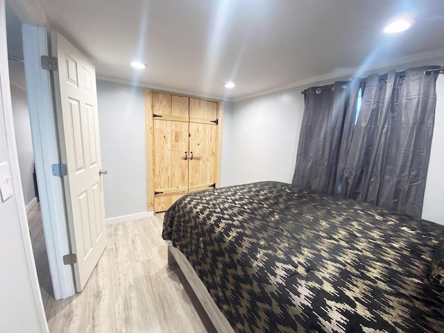 bedroom featuring light hardwood / wood-style flooring