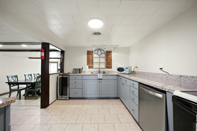 hall featuring ornamental molding, baseboards, and wood finished floors