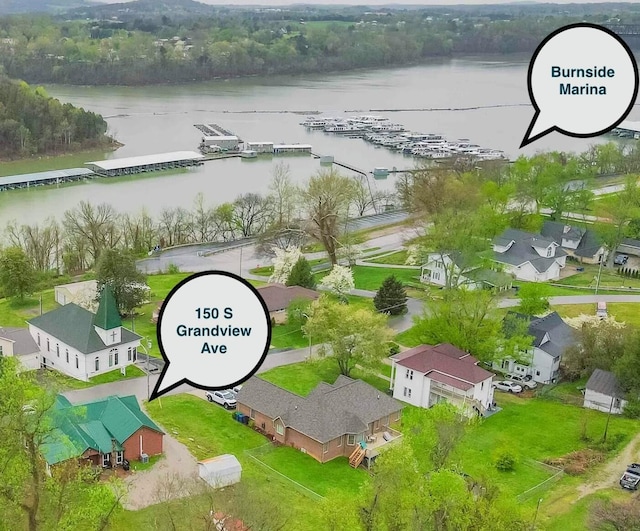 aerial view featuring a residential view and a water view