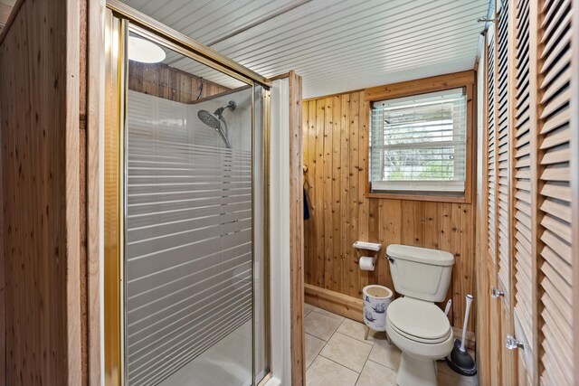 bathroom with wood walls and vanity