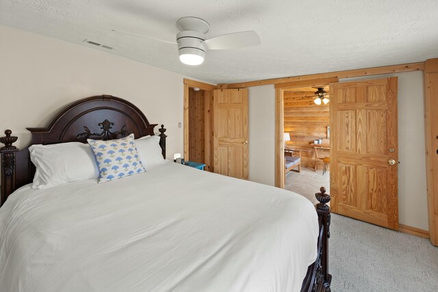 entryway featuring light tile patterned flooring, wooden walls, wood ceiling, vaulted ceiling, and french doors