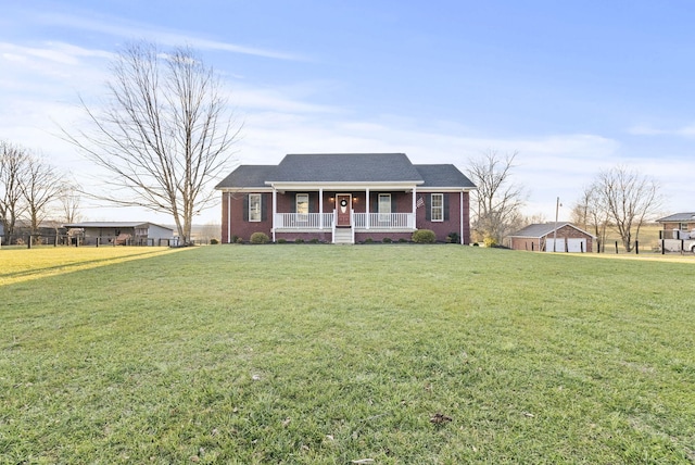 single story home featuring a front lawn, a porch, and a garage