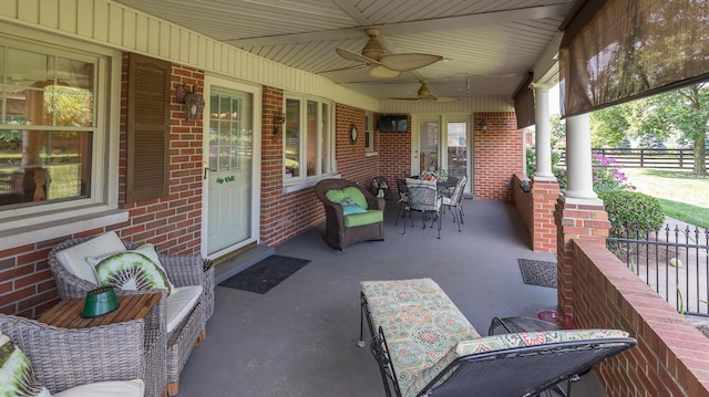 view of patio featuring ceiling fan and covered porch